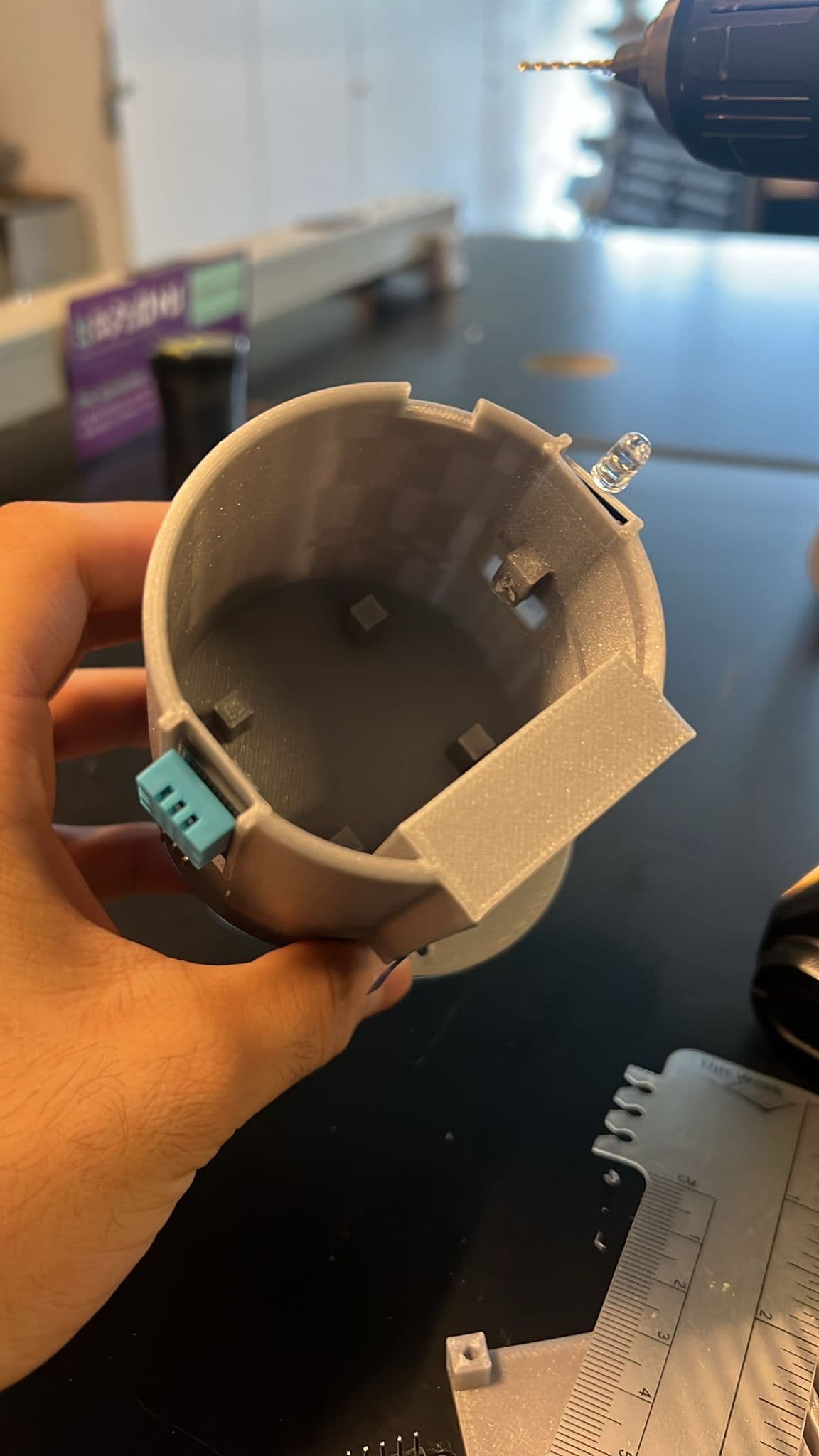 Close view into the Bloom pot prototype showing interior ceramic form and sensor placement
